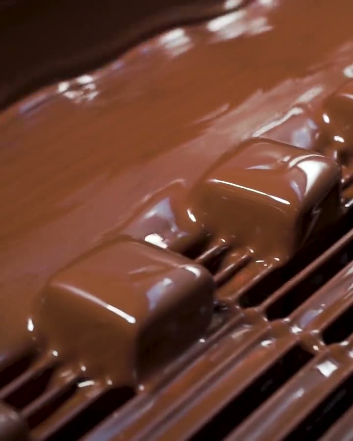 Chocolate moving through a production line
